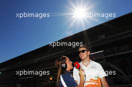(L to R): Paul di Resta (GBR) Sahara Force India F1 with Natalie Pinkham (GBR) Sky Sports Pitlane Reporter. 11.05.2012. Formula 1 World Championship, Rd 5, Spanish Grand Prix, Barcelona, Spain, Practice Day