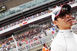 Kamui Kobayashi (JPN) Sauber on the grid. 10.05.2012. Formula 1 World Championship, Rd 5, Spanish Grand Prix, Barcelona, Spain, Race Day