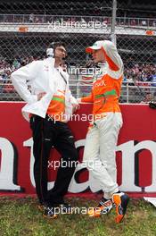 Nico Hulkenberg (GER) Sahara Force India F1 on the grid with Bradley Joyce (GBR) Sahara Force India F1 Race Engineer. 10.05.2012. Formula 1 World Championship, Rd 5, Spanish Grand Prix, Barcelona, Spain, Race Day