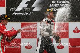 Race winner Pastor Maldonado (VEN) Williams celebrates on the podium with Fernando Alonso (ESP) Ferrari. 10.05.2012. Formula 1 World Championship, Rd 5, Spanish Grand Prix, Barcelona, Spain, Race Day