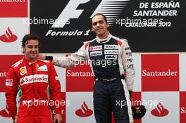 The podium (L to R): Fernando Alonso (ESP) Ferrari with race winner Pastor Maldonado (VEN) Williams. 10.05.2012. Formula 1 World Championship, Rd 5, Spanish Grand Prix, Barcelona, Spain, Race Day