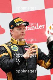 Kimi Raikkonen (FIN) Lotus F1 Team celebrates his third position on the podium. 10.05.2012. Formula 1 World Championship, Rd 5, Spanish Grand Prix, Barcelona, Spain, Race Day