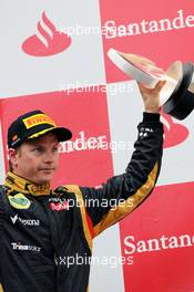 Kimi Raikkonen (FIN) Lotus F1 Team celebrates his third position on the podium. 10.05.2012. Formula 1 World Championship, Rd 5, Spanish Grand Prix, Barcelona, Spain, Race Day