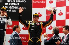 Kimi Raikkonen (FIN) Lotus F1 Team celebrates his third position on the podium. 10.05.2012. Formula 1 World Championship, Rd 5, Spanish Grand Prix, Barcelona, Spain, Race Day