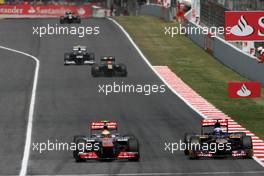 Lewis Hamilton (GBR), McLaren Mercedes and Jean-Eric Vergne (FRA), Scuderia Toro Rosso   13.05.2012. Formula 1 World Championship, Rd 5, Spanish Grand Prix, Barcelona, Spain, Race Day