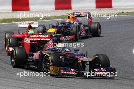 Jean-Eric Vergne (FRA) Scuderia Toro Rosso STR7 leads Felipe Massa (BRA) Ferrari F2012 and Mark Webber (AUS) Red Bull Racing RB8. 10.05.2012. Formula 1 World Championship, Rd 5, Spanish Grand Prix, Barcelona, Spain, Race Day