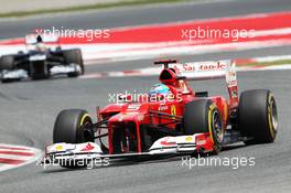 Fernando Alonso (ESP) Ferrari F2012 leads race winner Pastor Maldonado (VEN) Williams FW34. 10.05.2012. Formula 1 World Championship, Rd 5, Spanish Grand Prix, Barcelona, Spain, Race Day