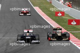 Pastor Maldonado (VEN), Williams F1 Team and Kimi Raikkonen (FIN), Lotus F1 Team  13.05.2012. Formula 1 World Championship, Rd 5, Spanish Grand Prix, Barcelona, Spain, Race Day