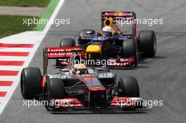 Lewis Hamilton (GBR) McLaren MP4/27 leads Sebastian Vettel (GER) Red Bull Racing RB8. 10.05.2012. Formula 1 World Championship, Rd 5, Spanish Grand Prix, Barcelona, Spain, Race Day
