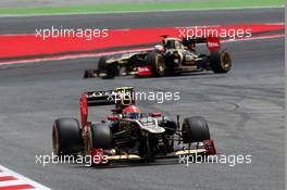 Romain Grosjean (FRA) Lotus F1 E20 leads team mate Kimi Raikkonen (FIN) Lotus F1 E20. 10.05.2012. Formula 1 World Championship, Rd 5, Spanish Grand Prix, Barcelona, Spain, Race Day