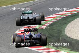 Michael Schumacher (GER) Mercedes AMG F1 W03 leads Sebastian Vettel (GER) Red Bull Racing RB8. 10.05.2012. Formula 1 World Championship, Rd 5, Spanish Grand Prix, Barcelona, Spain, Race Day