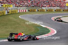 Sebastian Vettel (GER) Red Bull Racing RB8 follows Jenson Button (GBR) McLaren MP4/27. 10.05.2012. Formula 1 World Championship, Rd 5, Spanish Grand Prix, Barcelona, Spain, Race Day