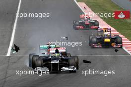 Michael Schumacher (GER), Mercedes GP crashes with Bruno Senna (BRE), Williams F1 Team at turn 1 13.05.2012. Formula 1 World Championship, Rd 5, Spanish Grand Prix, Barcelona, Spain, Race Day