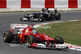 Fernando Alonso (ESP) Ferrari F2012 leads Pastor Maldonado (VEN) Williams FW34. 10.05.2012. Formula 1 World Championship, Rd 5, Spanish Grand Prix, Barcelona, Spain, Race Day