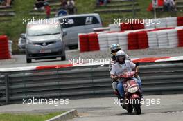 Bruno Senna (BRA) Williams retired from the race and returns to the pits on a moped. 10.05.2012. Formula 1 World Championship, Rd 5, Spanish Grand Prix, Barcelona, Spain, Race Day