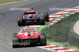 Jean-Eric Vergne (FRA) Scuderia Toro Rosso STR7 leads Felipe Massa (BRA) Ferrari F2012. 10.05.2012. Formula 1 World Championship, Rd 5, Spanish Grand Prix, Barcelona, Spain, Race Day