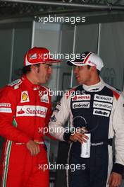 (L to R): third placed Fernando Alonso (ESP) Ferrari talks with second placed Pastor Maldonado (VEN) Williams in parc ferme. 12.05.2012. Formula 1 World Championship, Rd 5, Spanish Grand Prix, Barcelona, Spain, Qualifying Day