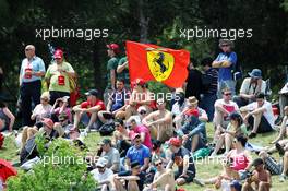 Fans watch qualifying and a Ferrari flag flies. 12.05.2012. Formula 1 World Championship, Rd 5, Spanish Grand Prix, Barcelona, Spain, Qualifying Day