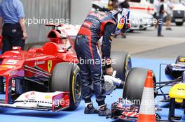 Sebastian Vettel (GER) Red Bull Racing RB8 cools his brakes in parc ferme. 12.05.2012. Formula 1 World Championship, Rd 5, Spanish Grand Prix, Barcelona, Spain, Qualifying Day