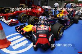 Sebastian Vettel (GER) cools the brakes on his Red Bull Racing RB8 in parc ferme. 12.05.2012. Formula 1 World Championship, Rd 5, Spanish Grand Prix, Barcelona, Spain, Qualifying Day