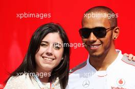 Lewis Hamilton (GBR) McLaren with a fan. 12.05.2012. Formula 1 World Championship, Rd 5, Spanish Grand Prix, Barcelona, Spain, Qualifying Day