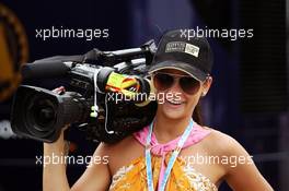 Glamorous camera woman. 10.05.2012. Formula 1 World Championship, Rd 5, Spanish Grand Prix, Barcelona, Spain, Race Day