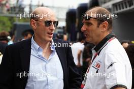 (L to R): Chris Goodwin (GBR) Manager of Bruno Senna (BRA) Williams with Bruno Michel (FRA) GP2. 10.05.2012. Formula 1 World Championship, Rd 5, Spanish Grand Prix, Barcelona, Spain, Race Day