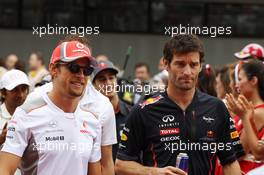 (L to R): Jenson Button (GBR) McLaren with Mark Webber (AUS) Red Bull Racing on the drivers parade. 10.05.2012. Formula 1 World Championship, Rd 5, Spanish Grand Prix, Barcelona, Spain, Race Day