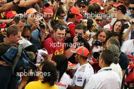 Lewis Hamilton (GBR) McLaren signs autographs for the fans. 10.05.2012. Formula 1 World Championship, Rd 5, Spanish Grand Prix, Barcelona, Spain, Preparation Day