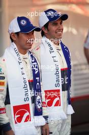 Chelsea Football club tie in with the Sauber F1 Team (L to R): Kamui Kobayashi (JPN) Sauber and team mate Sergio Perez (MEX) Sauber. 10.05.2012. Formula 1 World Championship, Rd 5, Spanish Grand Prix, Barcelona, Spain, Preparation Day