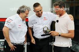 (L to R): Norbert Haug (GER) Mercedes Sporting Director and Martin Whitmarsh (GBR) McLaren Chief Executive Officer celebrate 300 Grands Prix partnership with McLaren and Mercedes. 22.06.2012. Formula 1 World Championship, Rd 8, European Grand Prix, Valencia, Spain, Practice Day