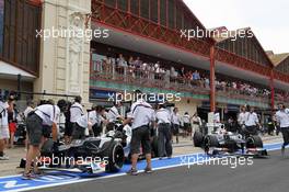 (L to R): Sergio Perez (MEX) Sauber C31 and team mate Kamui Kobayashi (JPN) Sauber C31 in the pits. 22.06.2012. Formula 1 World Championship, Rd 8, European Grand Prix, Valencia, Spain, Practice Day