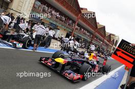 Sebastian Vettel (GER) Red Bull Racing RB8 in the pits. 22.06.2012. Formula 1 World Championship, Rd 8, European Grand Prix, Valencia, Spain, Practice Day