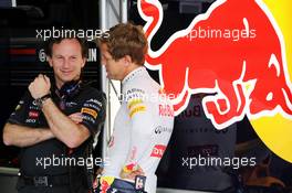 (L to R): Christian Horner (GBR) Red Bull Racing Team Principal with Sebastian Vettel (GER) Red Bull Racing. 22.06.2012. Formula 1 World Championship, Rd 8, European Grand Prix, Valencia, Spain, Practice Day