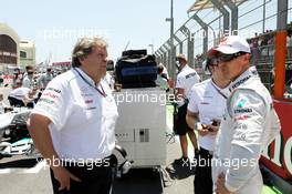 (L to R): Norbert Haug (GER) Mercedes Sporting Director with msp on the grid. 24.06.2012. Formula 1 World Championship, Rd 8, European Grand Prix, Valencia, Spain, Race Day