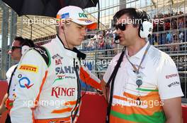 (L to R): Nico Hulkenberg (GER) Sahara Force India F1 with Bradley Joyce (GBR) Sahara Force India F1 Race Engineer on the grid. 24.06.2012. Formula 1 World Championship, Rd 8, European Grand Prix, Valencia, Spain, Race Day