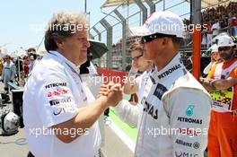 (L to R): Norbert Haug (GER) Mercedes Sporting Director and Michael Schumacher (GER) Mercedes AMG F1 on the grid. 24.06.2012. Formula 1 World Championship, Rd 8, European Grand Prix, Valencia, Spain, Race Day