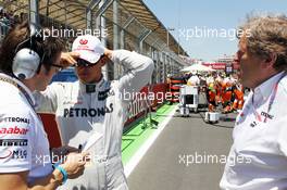 (L to R): Michael Schumacher (GER) Mercedes AMG F1 and Norbert Haug (GER) Mercedes Sporting Director on the grid. 24.06.2012. Formula 1 World Championship, Rd 8, European Grand Prix, Valencia, Spain, Race Day