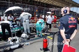 Adrian Newey (GBR) Red Bull Racing Chief Technical Officer looks at the Mercedes AMG F1 W03 of Nico Rosberg (GER) Mercedes AMG F1 on the grid. 24.06.2012. Formula 1 World Championship, Rd 8, European Grand Prix, Valencia, Spain, Race Day