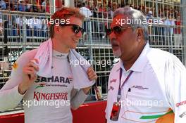 (L to R): Nico Hulkenberg (GER) Sahara Force India F1 with Dr. Vijay Mallya (IND) Sahara Force India F1 Team Owner on the grid. 24.06.2012. Formula 1 World Championship, Rd 8, European Grand Prix, Valencia, Spain, Race Day