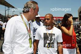 Roberto Carlos (BRA) Football Player with Fabiana Flosi (BRA). 24.06.2012. Formula 1 World Championship, Rd 8, European Grand Prix, Valencia, Spain, Race Day