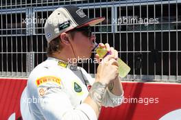 Kimi Raikkonen (FIN) Lotus F1 Team on the grid. 24.06.2012. Formula 1 World Championship, Rd 8, European Grand Prix, Valencia, Spain, Race Day