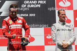 1st place Fernando Alonso (ESP), Scuderia Ferrari with 3rd place Michael Schumacher (GER), Mercedes AMG Petronas  24.06.2012. Formula 1 World Championship, Rd 8, European Grand Prix, Valencia, Spain, Race Day
