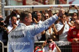 Michael Schumacher (GER) Mercedes AMG F1 celebrates his third position in parc ferme. 24.06.2012. Formula 1 World Championship, Rd 8, European Grand Prix, Valencia, Spain, Race Day