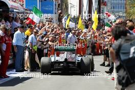 Third palced Michael Schumacher (GER) Mercedes AMG F1 W03 enters parc ferme. 24.06.2012. Formula 1 World Championship, Rd 8, European Grand Prix, Valencia, Spain, Race Day