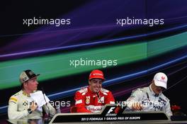 The post race FIA Press Conference Kimi Raikkonen (FIN) Lotus F1 Team, second; Fernando Alonso (ESP) Ferrari, race winner; Michael Schumacher (GER) Mercedes AMG F1, third. 24.06.2012. Formula 1 World Championship, Rd 8, European Grand Prix, Valencia, Spain, Race Day