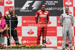 1st place Fernando Alonso (ESP), Scuderia Ferrari with 2nd place Kimi Raikkonen, Lotus Renault F1 Team and 3rd place Michael Schumacher (GER), Mercedes AMG Petronas  24.06.2012. Formula 1 World Championship, Rd 8, European Grand Prix, Valencia, Spain, Race Day