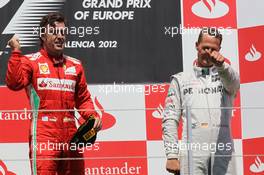 1st place Fernando Alonso (ESP), Scuderia Ferrari with 3rd place Michael Schumacher (GER), Mercedes AMG Petronas  24.06.2012. Formula 1 World Championship, Rd 8, European Grand Prix, Valencia, Spain, Race Day