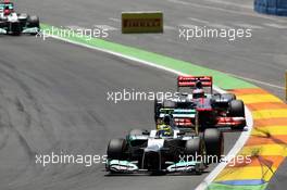 Nico Rosberg (GER) Mercedes AMG F1 W03 leads Jenson Button (GBR) McLaren MP4/27. 24.06.2012. Formula 1 World Championship, Rd 8, European Grand Prix, Valencia, Spain, Race Day