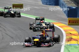 Mark Webber (AUS) Red Bull Racing RB8 leads Heikki Kovalainen (FIN) Caterham CT01 and Vitaly Petrov (RUS) Caterham CT01. 24.06.2012. Formula 1 World Championship, Rd 8, European Grand Prix, Valencia, Spain, Race Day